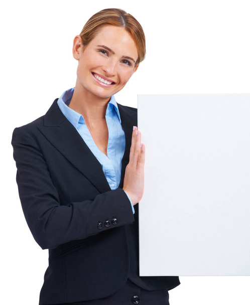 Advertising your message. A young businesswoman holding a placard - Foto, Imagen