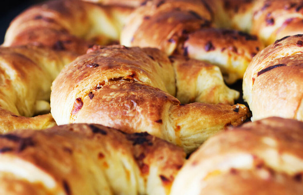 Nothing like a freshly-baked croissant in the morning. freshly-baked croissants - Photo, Image