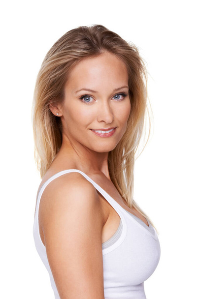 Her beauty and wellbeing are important to her. Portrait of a beautiful blond woman isolated on a white background - Foto, Bild