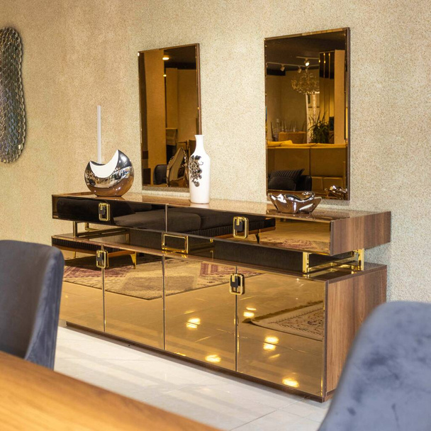 Golden dressing table, bedroom furniture mirror close up - Baku, Azerbaijan, 01.04.2022 - Fotó, kép