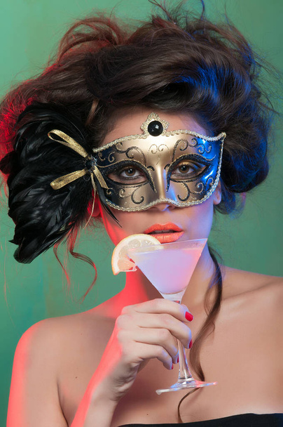 woman with colorful carnival mask - 写真・画像