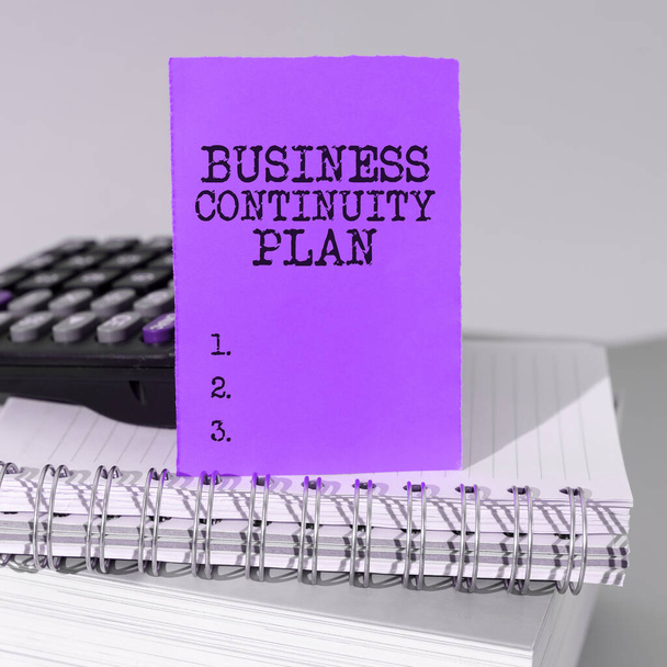 Text sign showing Business Continuity Plan, Word Written on creating systems prevention deal potential threats - Photo, Image