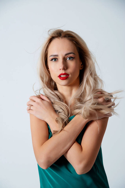 beautiful blonde woman posing in studio - Photo, image