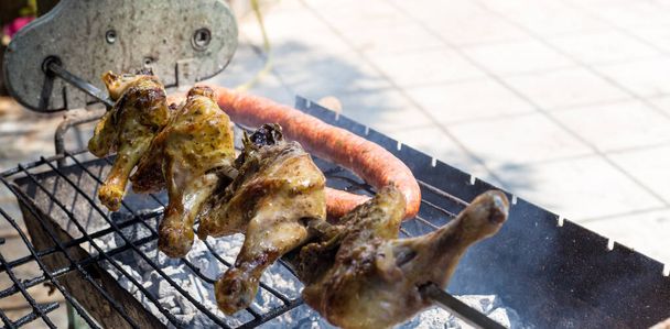 Typical Greek barbeque, with sausage and chicken - Photo, Image