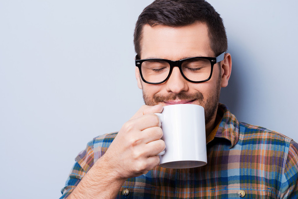 Man holding cup of coffee - Photo, Image