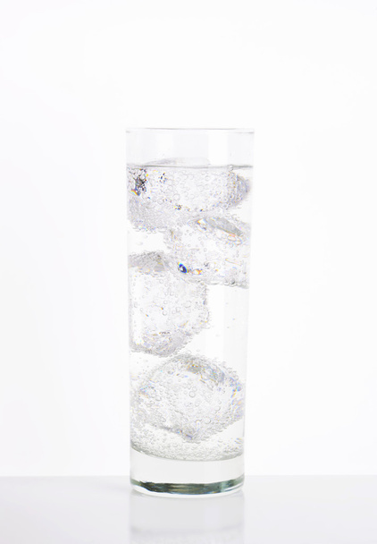 Glass of ice fizzy water - Photo, Image