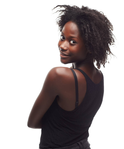 Giving you a peek. Portrait of a beautiful young woman expressing positivity on a white background - Fotó, kép
