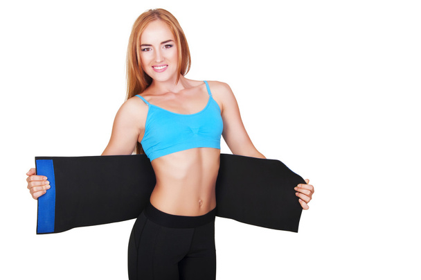 Woman doing fitness using belt for weight loss - Zdjęcie, obraz