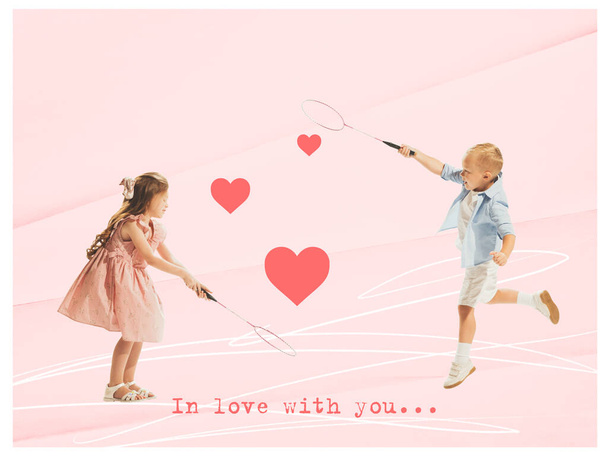 Contemporary art collage. Cute little children, boy and girl playing badminton over pink background. Friendship. Concept of love, relationship, Valentines day, romance, emotions. Poster, ad - Photo, image