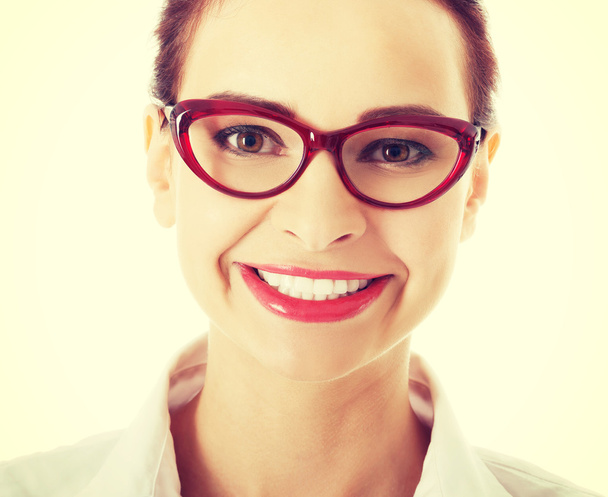 Beautiful business woman in red eyeglasses. - Valokuva, kuva