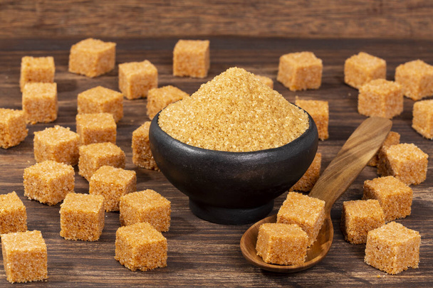 Crystals And Cubes Of Unrefined Brown Cane Sugar - Saccharum officinarum - Photo, Image