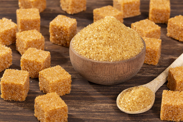 Crystals And Cubes Of Unrefined Brown Cane Sugar - Saccharum officinarum - Photo, Image