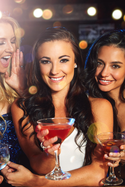 Women, cocktail drink and party with smile in portrait, friends on night out for new year celebration in nightclub. Alcohol, drinking glasses and happy with cocktails, happy hour and ladies night - Photo, Image