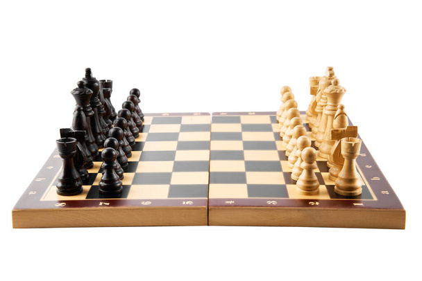 Vintage chess board with checkers, pawns, knights, rooks, bishops, queen and king, black and white colors. Chess board game for ideas and competition and strategy, business success concept.                                - Photo, Image