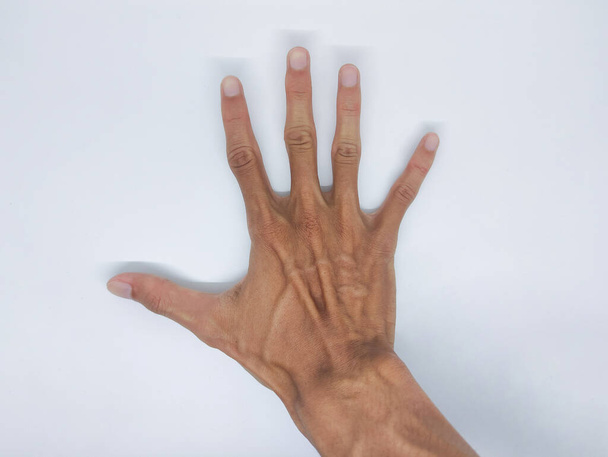 Skinny man right hand on isolated background - Photo, Image