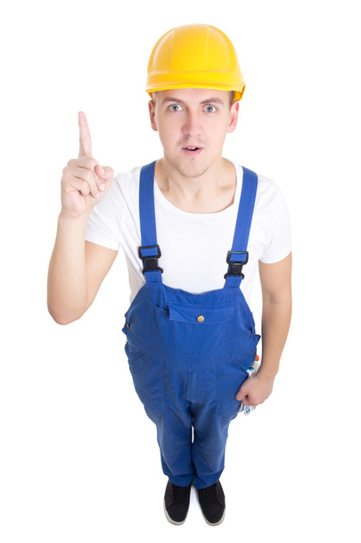idea concept - funny man builder in blue uniform isolated on whi - Φωτογραφία, εικόνα