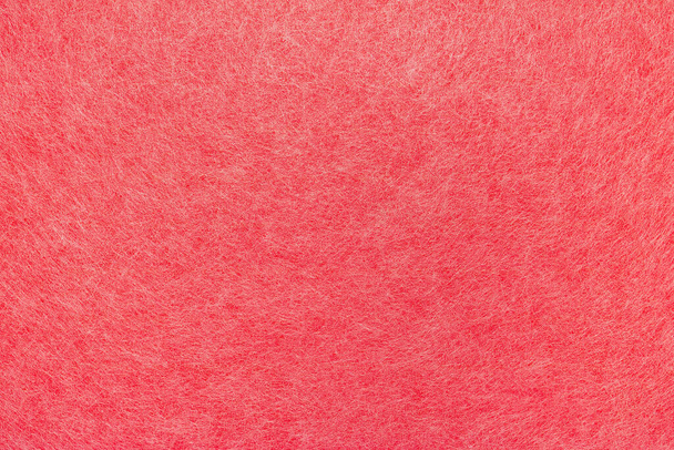 Abstract red background covered with cobwebs of white fibers. - Foto, Imagen