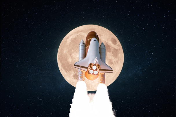 New space rocket shuttle with blast takes off into starry space with full amazing moon. Successful launch and lift on spacecraft to the moon. Start space expedition mission to the moon - Photo, Image