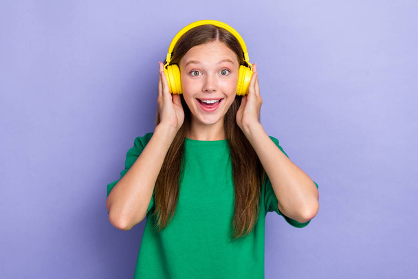 Photo of overjoyed pretty lady wear stylish clothes rejoice buy modern earbuds isolated on purple color background. - Φωτογραφία, εικόνα
