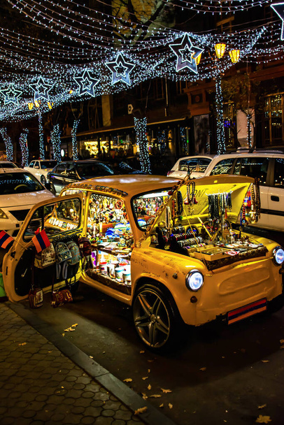 Yellow small car turned into a gift shop - Photo, Image