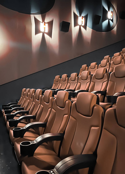 Cinema and entertainment, empty brown movie theatre seats for tv show streaming service and film industry production branding - Fotografie, Obrázek