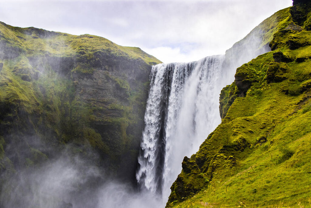 Skogafoss Waterfalls in Iceland seen during Golden Circle Route Tour - Fotó, kép