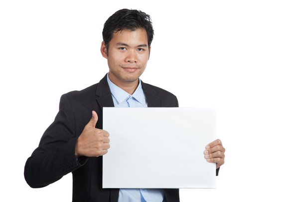Asian businessman show thumbs up with blank sign - Фото, зображення