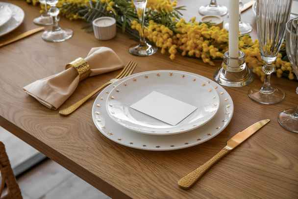 Beautiful table setting with card in room, closeup - 写真・画像