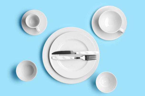 White table setting on blue background - Photo, Image