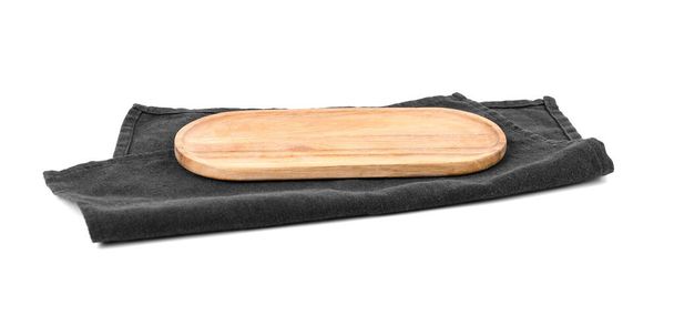 Wooden board with black napkin on white background - Photo, Image