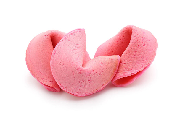 Biscuits de fortune rose sur fond blanc - Photo, image