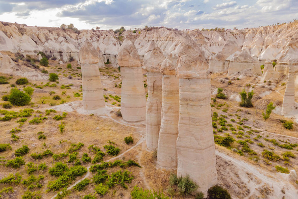 Unique geological formations in Love Valley in Cappadocia, popular travel destination in Turkey. - Fotó, kép