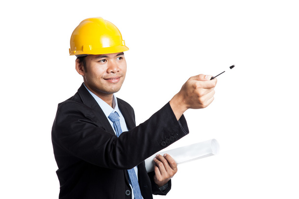 Asian engineer man hold a blueprint point with a pen - Photo, image