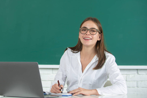 Female student on lesson lecture in classroom at high school or college, online learning at school, distance education - Φωτογραφία, εικόνα