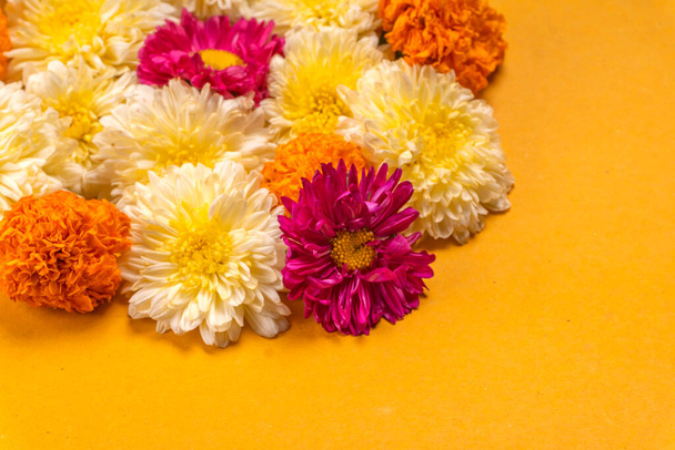 close-up view of beautiful flowers on yellow background - Photo, Image