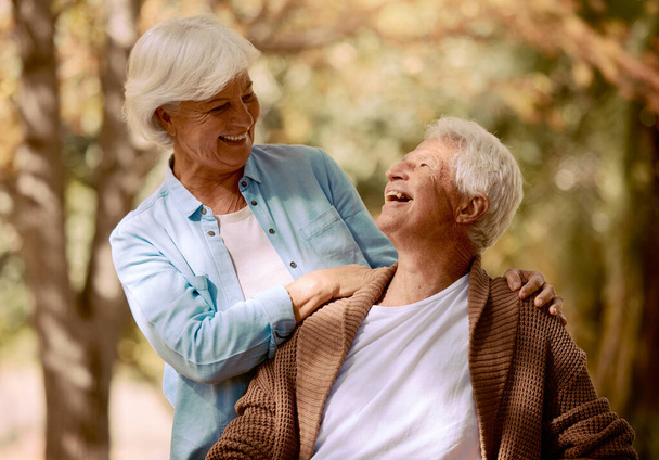 Laugh, love and senior couple bond in house garden, nature park or home backyard in trust, security or future support. Happy smile, retirement life and elderly man in Germany with woman outdoor. - Photo, Image