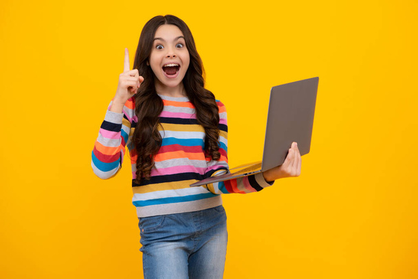 Amazed teenager. Back to school, Teenager school girl with laptop computer. Excited teen schoolgirl - Foto, Imagem