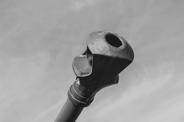 Cannon barrel. A close-up of the barrel end of a tank or artillery gun. - Photo, Image