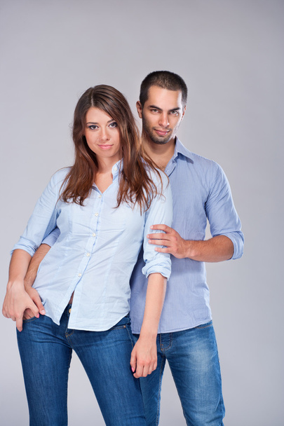 Young fashion expressing couple in jeans - Photo, Image