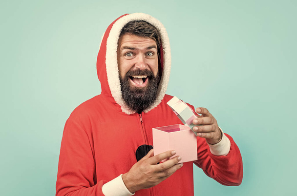 santa claus bearded man hold box wish happy new year and merry christmas holiday ready to celebrate winter party with fun and joy full of xmas presents and gifts, open present. - Foto, Bild