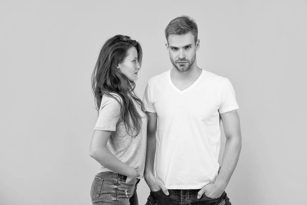 togetherness. concept of romantic relationship. fashion and beauty. sexy couple on yellow background. young students. man and woman. trendy guy and girl together. - Фото, зображення