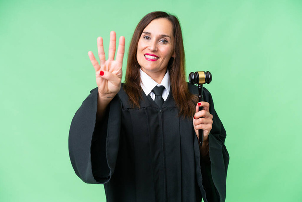 Bíró kaukázusi nő felett elszigetelt háttér boldog és számolás négy ujjal - Fotó, kép