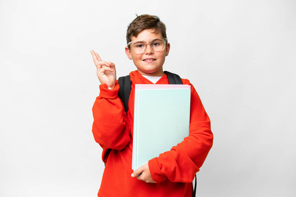 Little caucasian student kid over isolated background smiling and showing victory sign - Foto, Imagem