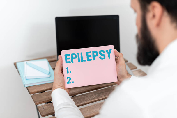 Текст, показывающий вдохновение эпилепсия, бизнес-концепция Четвертое по распространенности неврологическое расстройство Непредсказуемые припадки - Фото, изображение