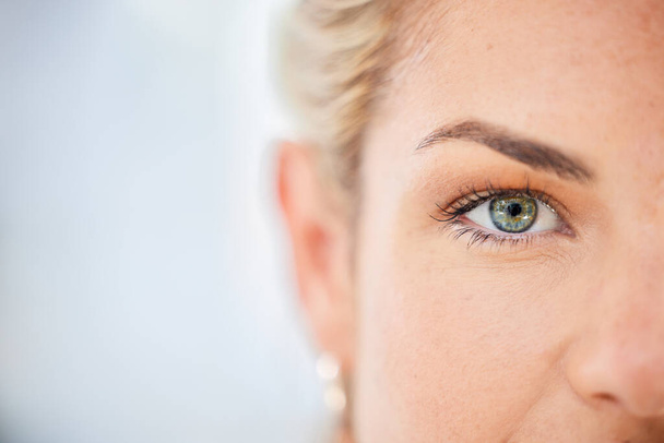 Half face, eyes and woman with mockup, focus and vision, awareness and natural cosmetics in Ireland. Closeup portrait of female, lady and seeing human with mock up, healthy perception and eye test. - Photo, Image