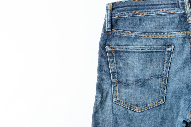 Close up shot back pocket of a blue jeans. - Foto, immagini