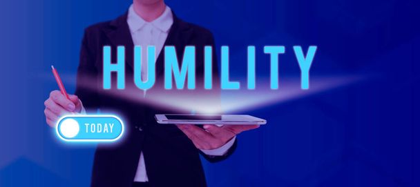 Escrevendo exibindo texto Humildade, Palavra para ser humilde é uma virtude para não se sentir excessivamente superior - Foto, Imagem