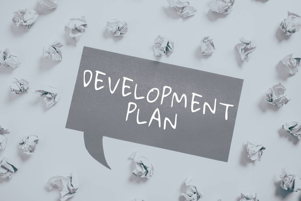 Rédaction de texte Plan de développement, Business met en valeur la planification de l'aménagement d'une zone de terre - Photo, image