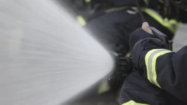 Firefighter team spay water to fire. - Footage, Video