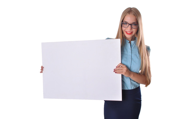 Happy smiling beautiful young woman showing blank signboard or copyspace, isolated over white background - Foto, imagen